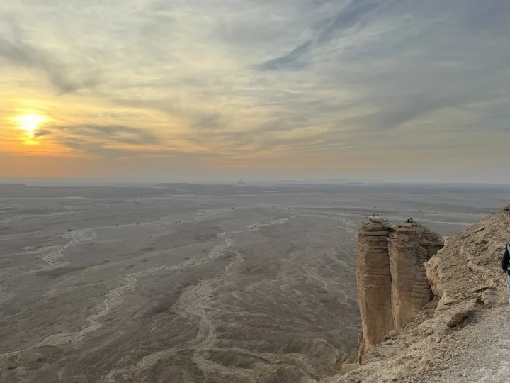 Tuwaiq escarpment and the landscape below at sunset