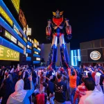 Visitors walking past illuminated anime displays at a Riyadh Season entertainment area