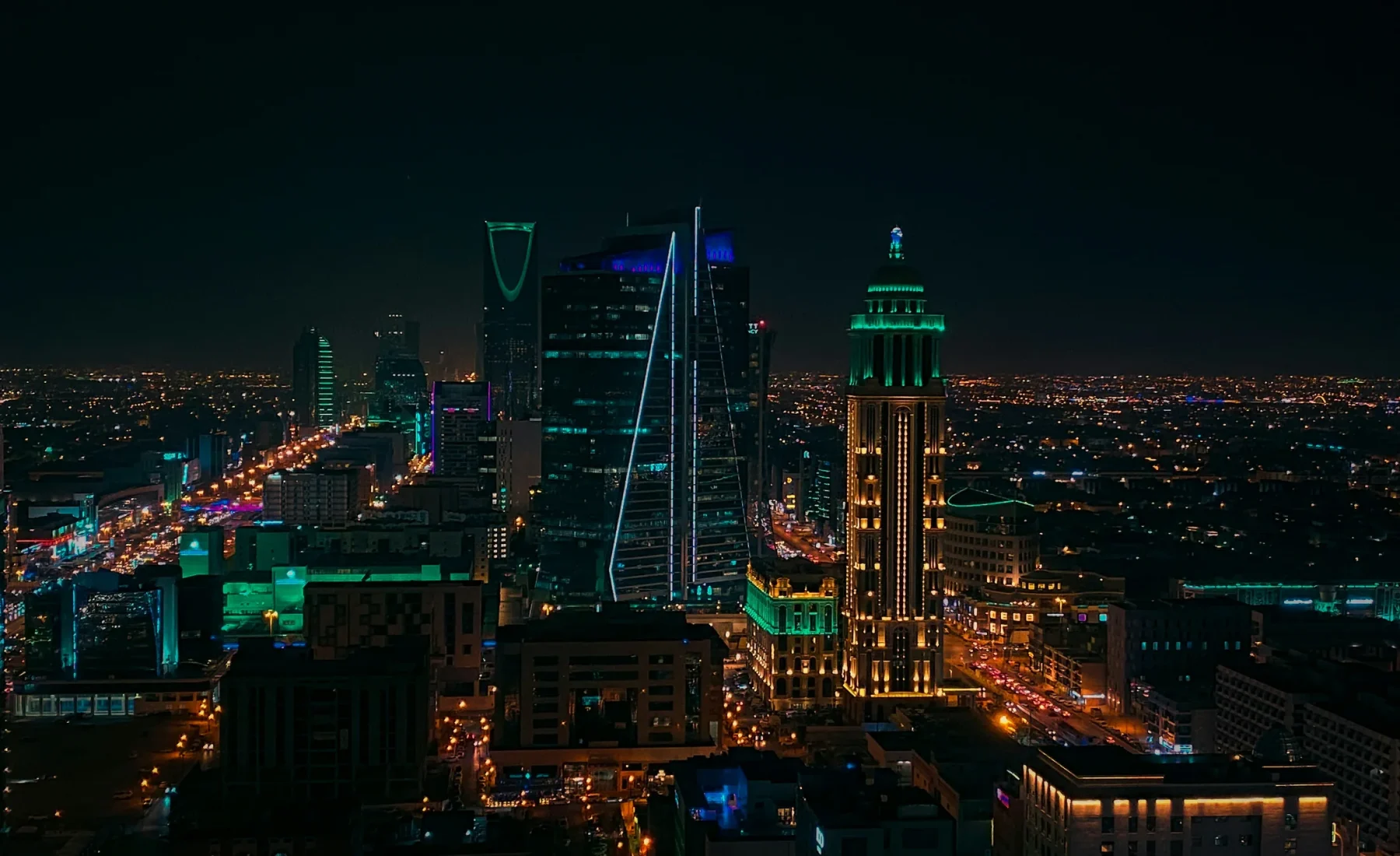 Riyadh skyline at night, with Kingdom Centre and illuminated city streets