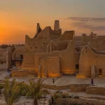 Mud-brick walls and palms at At-Turaif, Diriyah